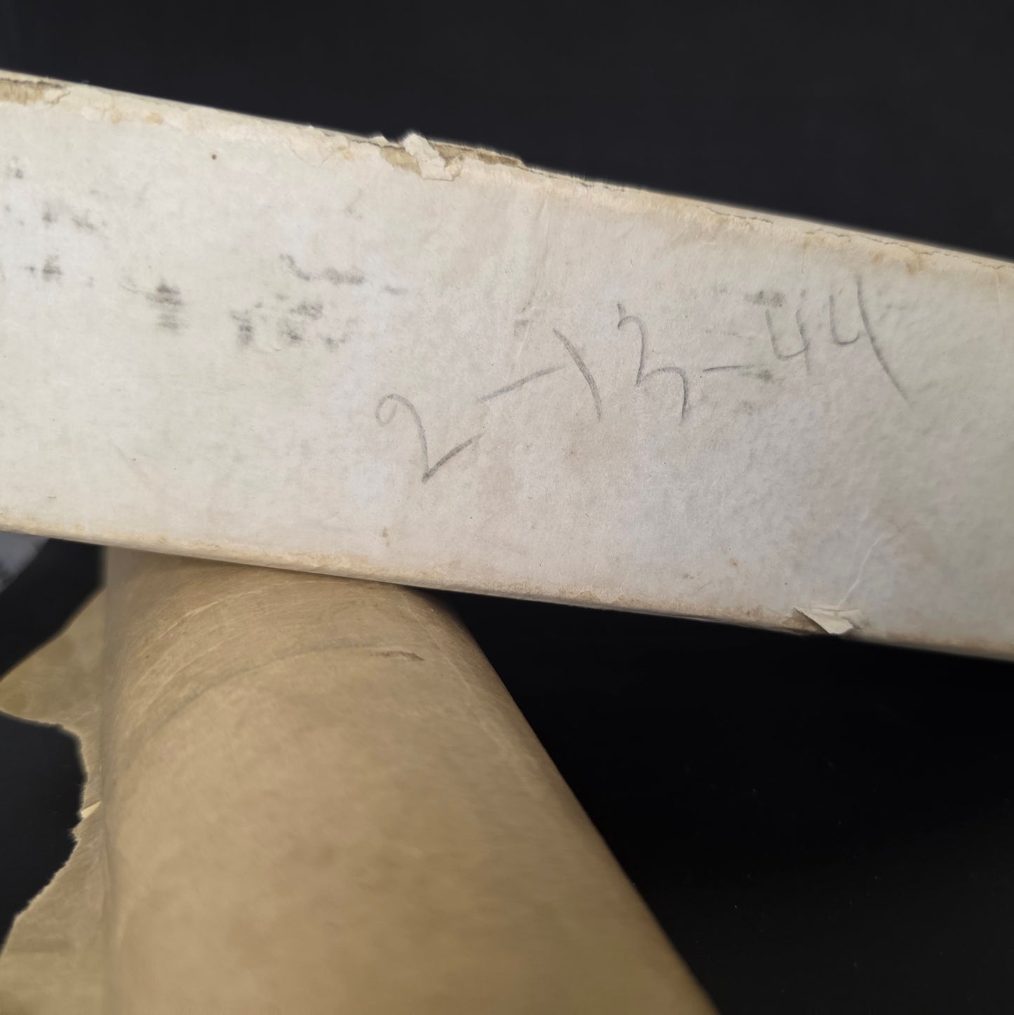 Mystery vintage piano roll box bottom portion showing 2-13-44 marking