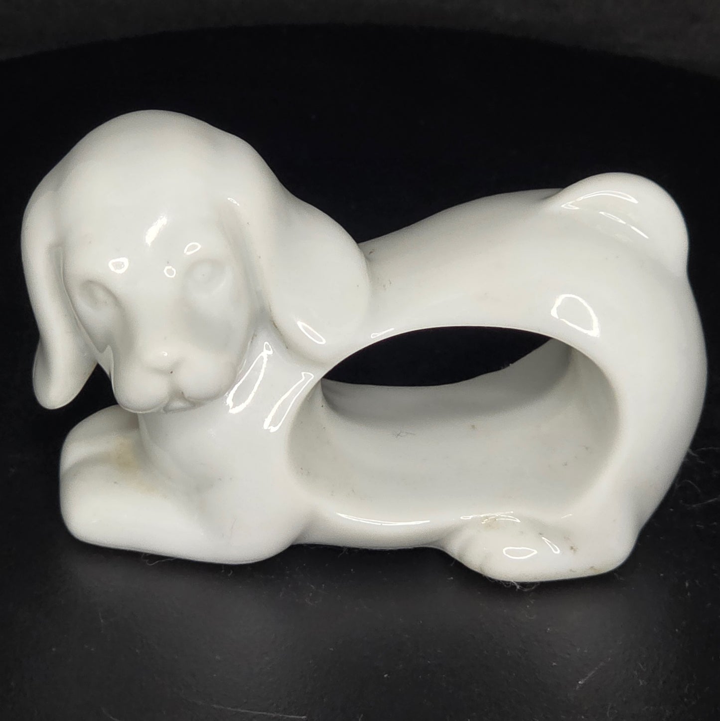 Vintage porcelain puppy dog napkin ring with small chip detail