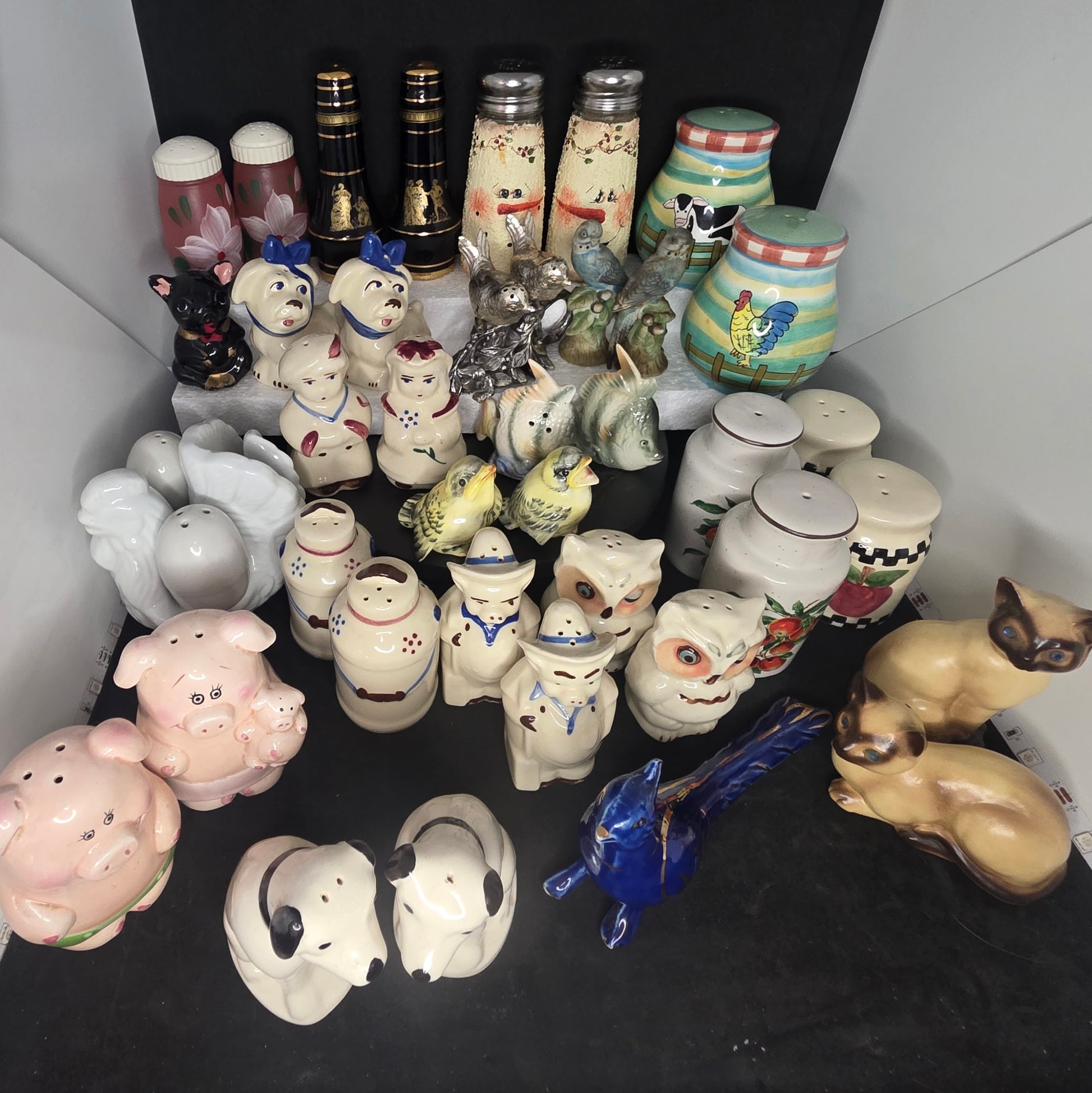 Vintage salt and pepper shaker collection spanning 1920s-1990s, curated selection of 21 options