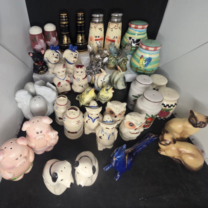 Vintage salt and pepper shaker collection spanning 1920s-1990s, curated selection of 21 options