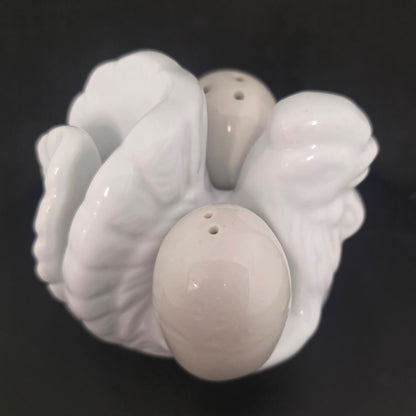 Side view of vintage chicken napkin holder, 4 inches tall