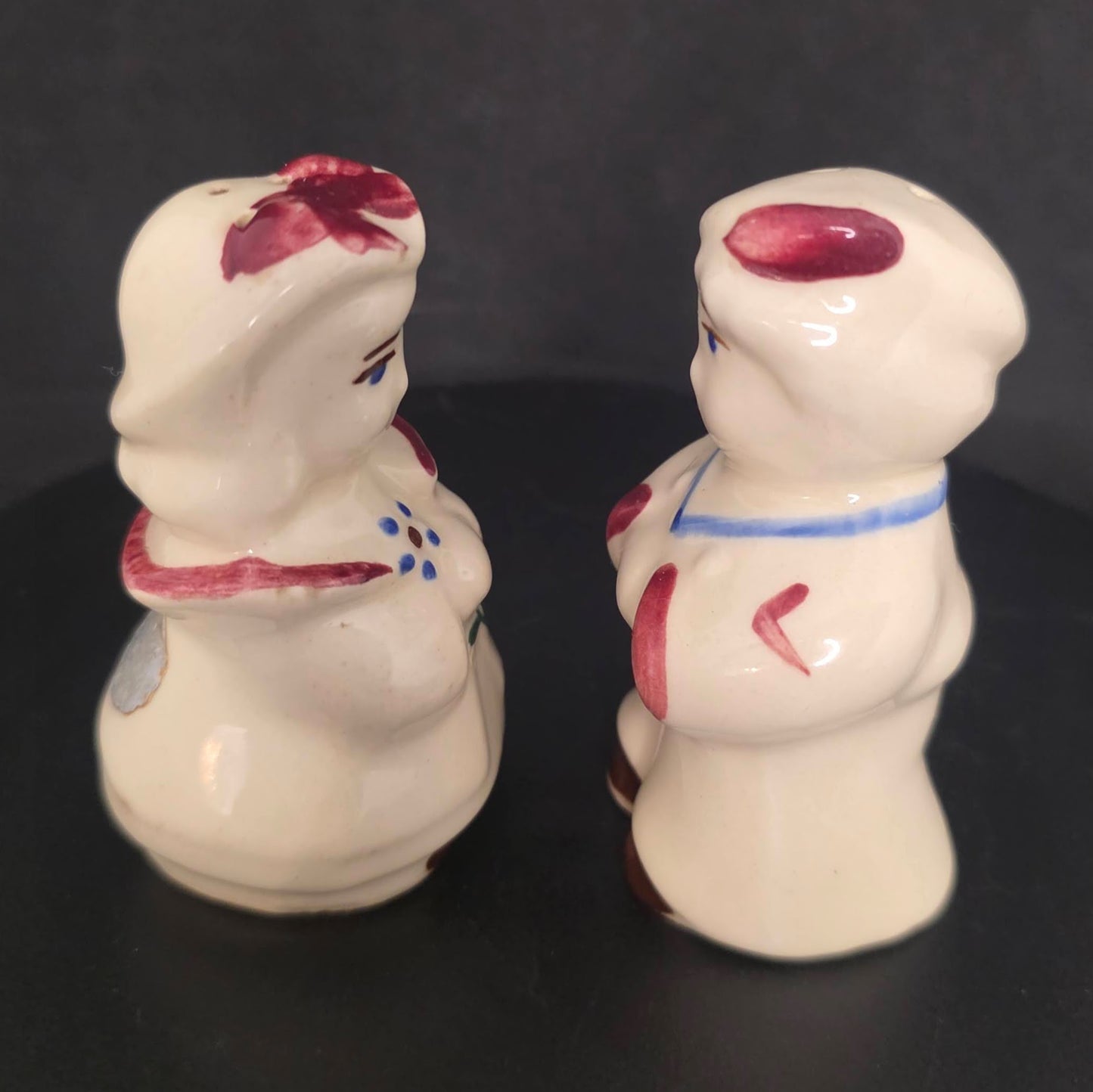 Side view of Little Boy Blue and Little Bo Peep shakers with stoppers