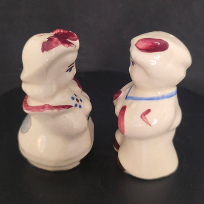 Side view of Little Boy Blue and Little Bo Peep shakers with stoppers