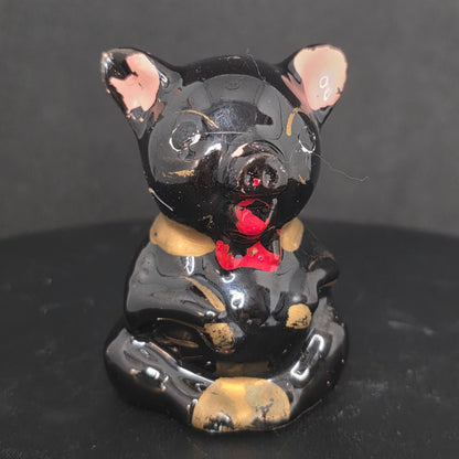Front view of black pig shaker showing cold paint details