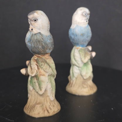 Side view of blue parakeet shakers marked KW3009