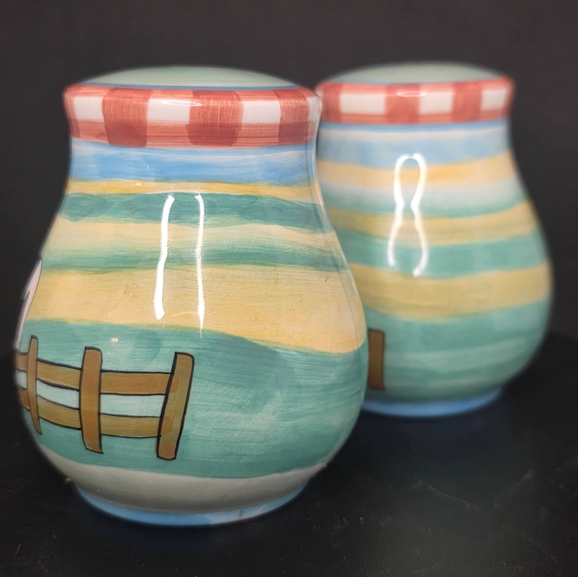 Side view of Young's Exclusive farm animal shakers with stoppers