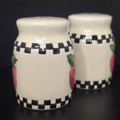 Side view of country apple milk can shakers showing checkerboard detail