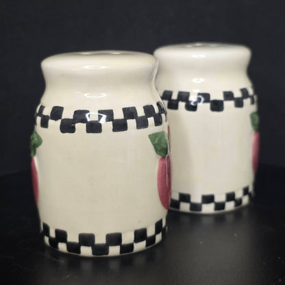 Side view of country apple milk can shakers showing checkerboard detail