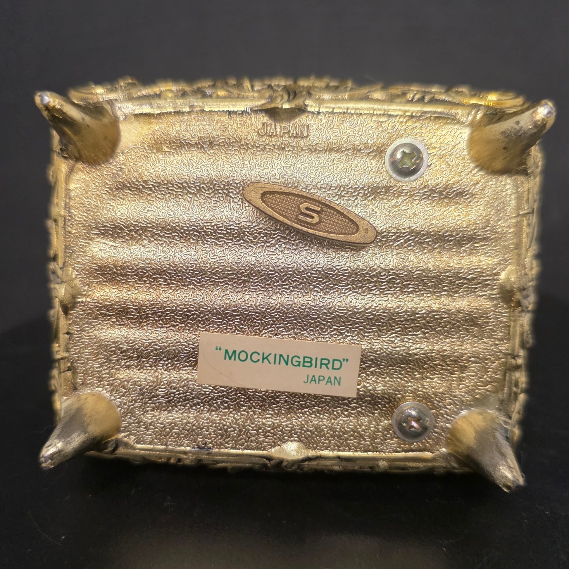 Bottom of 1970s Sankyo Japan music box showing maker's mark and details