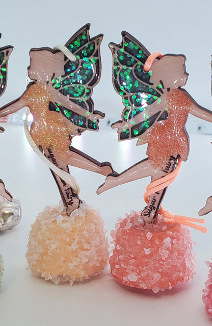 Decorative ornaments with a yellow and orange fairy design  on a light white background
