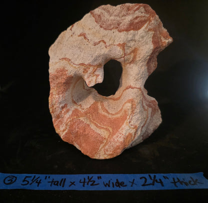 Marble-like stone with dimensions labeled on a dark background