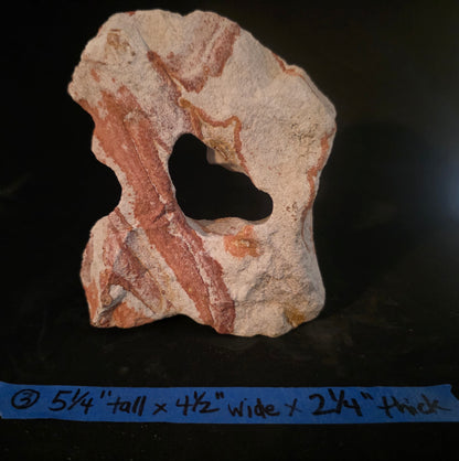 Decorative stone with a naturally formed on a black background