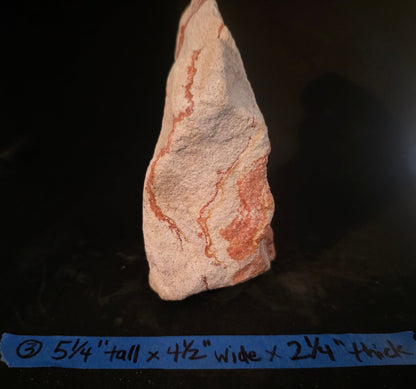 Marbled sandstone with dimensions labeled on a dark background